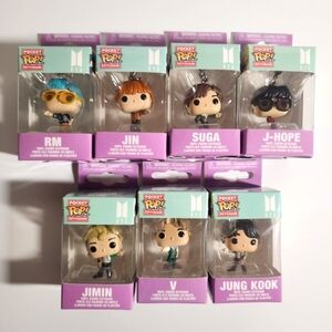 Funko Pop Keychain Set with Purple and Green Packaging